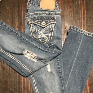 Amethyst size 1 jeans. Factory holes. Boot cut.